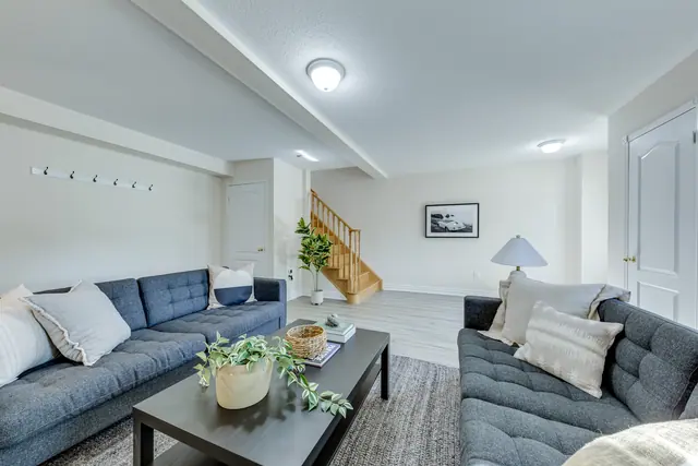 Ground-floor living room and staircase