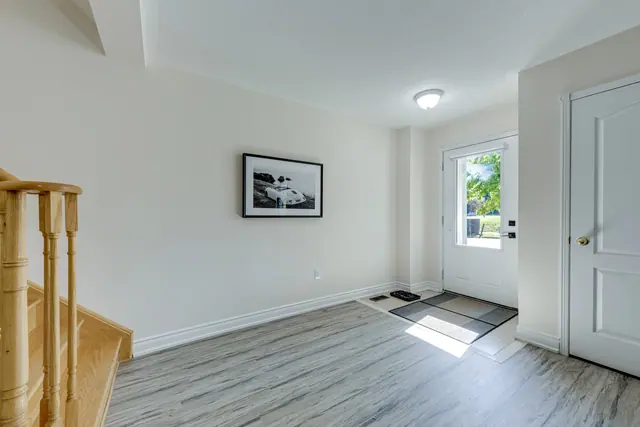 Ground-floor entry beside the stairs