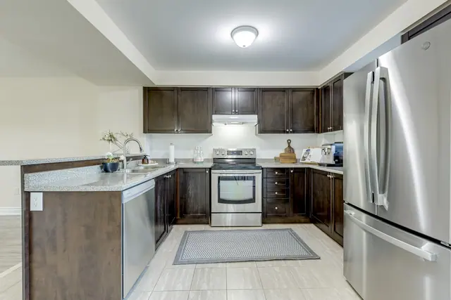 Kitchen with dishwasher and breakfast bar