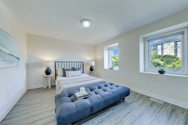 Primary bedroom with two windows
